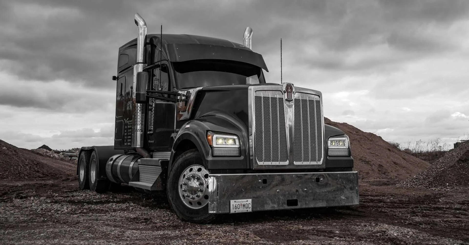 2023 grey Kenworth W990 with BTS Lighting Bi-Beam LED headlights amber light output