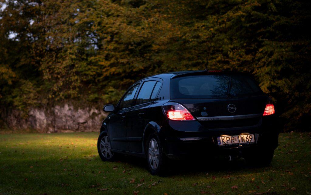Shedding Light On The Ultimate Upgrade: Why Led Bulbs Are The Best Choice For Your Headlights 4 Compact car with headlights turned on