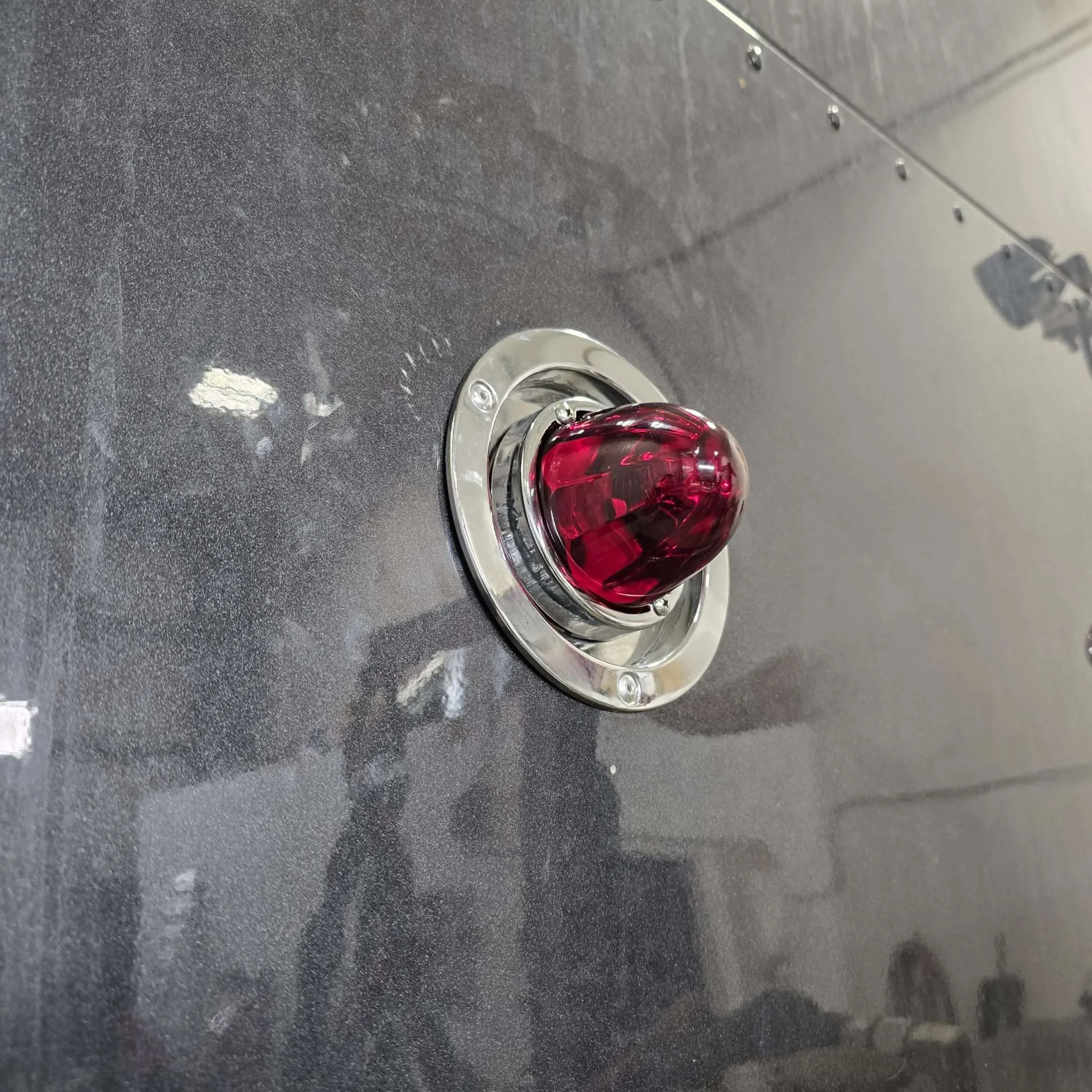 Red Glass is Class watermelon lights with Alpha Series Lighting recessed bunk adapter buckets installed on a 2023 Kenworth W990