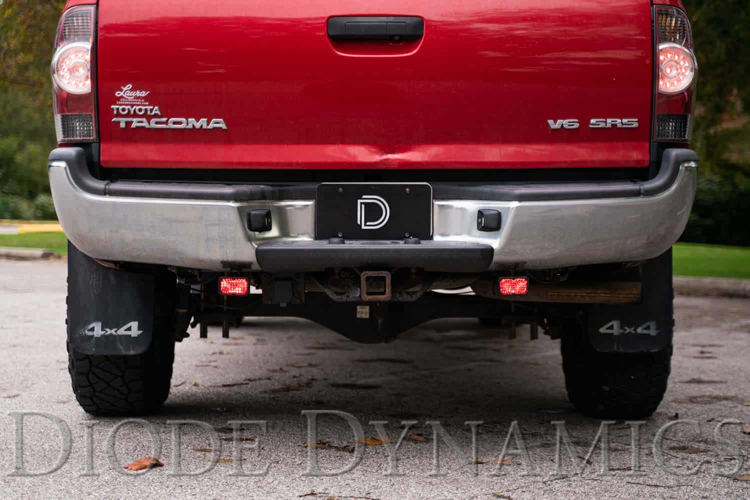 Diode Dynamics Stage Series Reverse Light Kit For 2005-2015 Toyota Tacoma C2 2.0 3 Red accent backlights on a 2005–2015 Tacoma. Installation photo shows the earlier two-inch pod housing; current kit is C2 2.0.