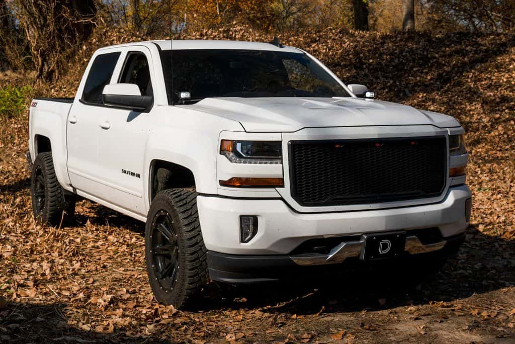 Diode Dynamics C2 2.0 Led Ditch Light Kit For 2014-2019 Silverado/Sierra 40 Silverado hood-corner mounting shown with the earlier two-inch pod housing. This is mounting context only; the current C2 2.0 kit is pictured separately.
