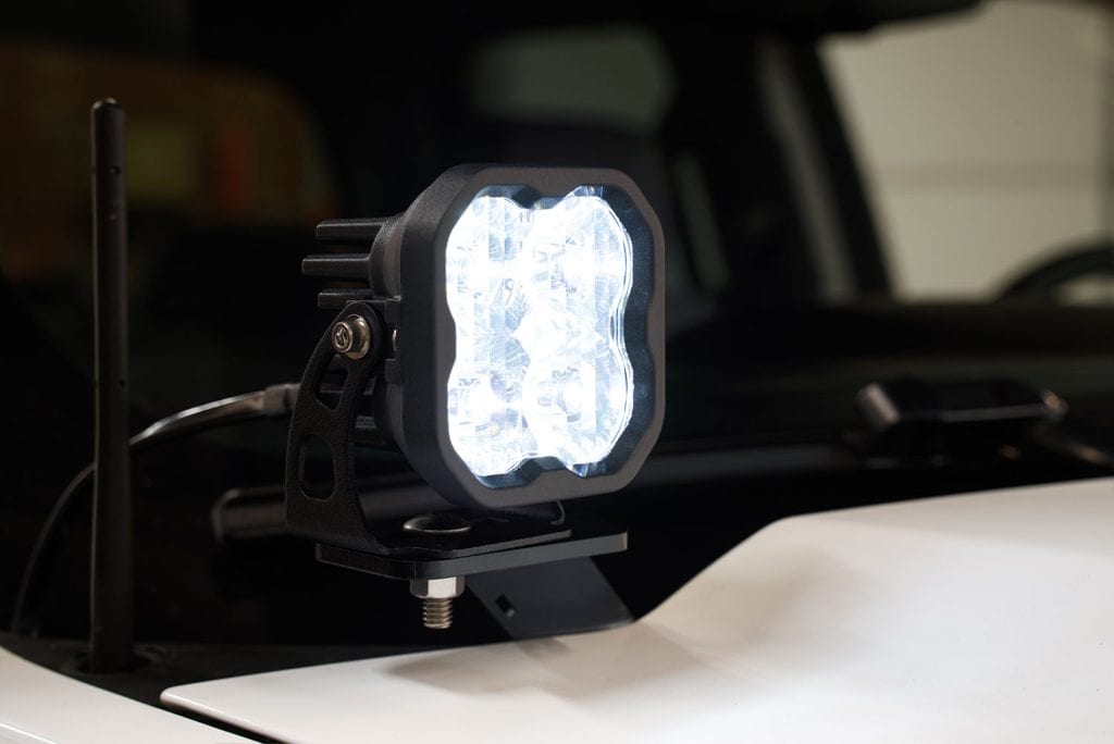 Diode Dynamics Ss3 Led Ditch Light Kit For 2014-2019 Silverado/Sierra 113 SS3 white main beam at the GMC hood corner; tier is not identified.