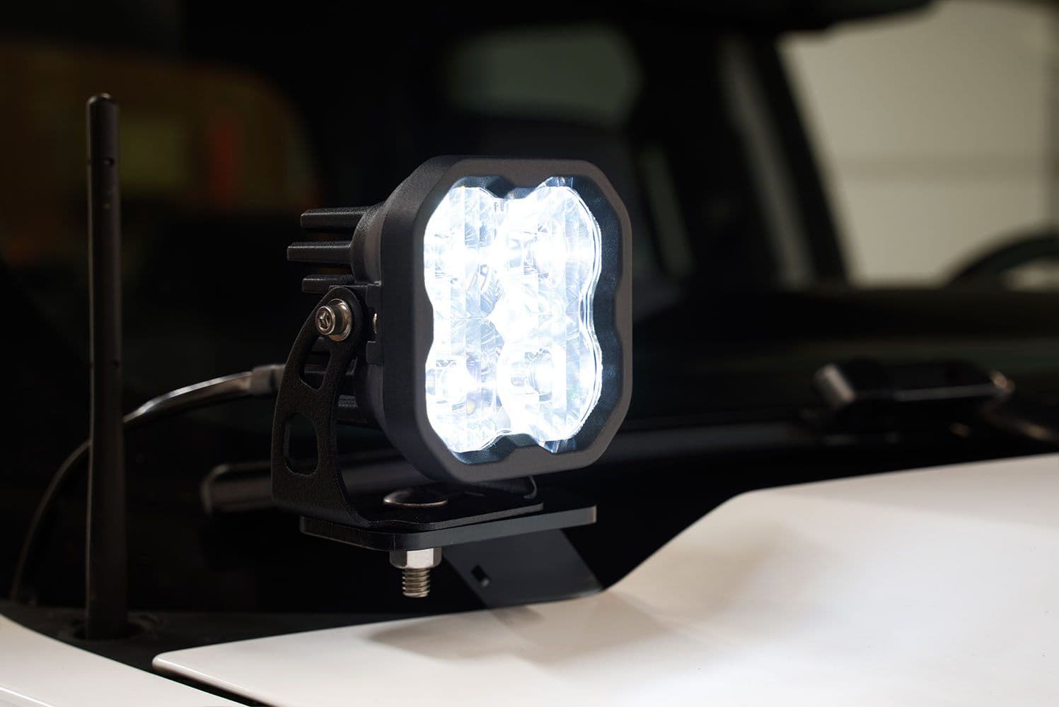 Diode Dynamics Ss3 Led Ditch Light Kit For 2014-2019 Silverado/Sierra 11 SS3 installed at the GMC hood corner. The lamp tier is not identified.