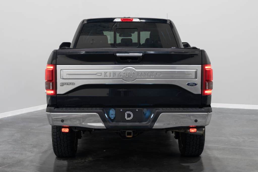 Red accent function and mounting position on the 2015–2020 F-150. This photograph shows the earlier two-inch housing, not a current-output comparison.