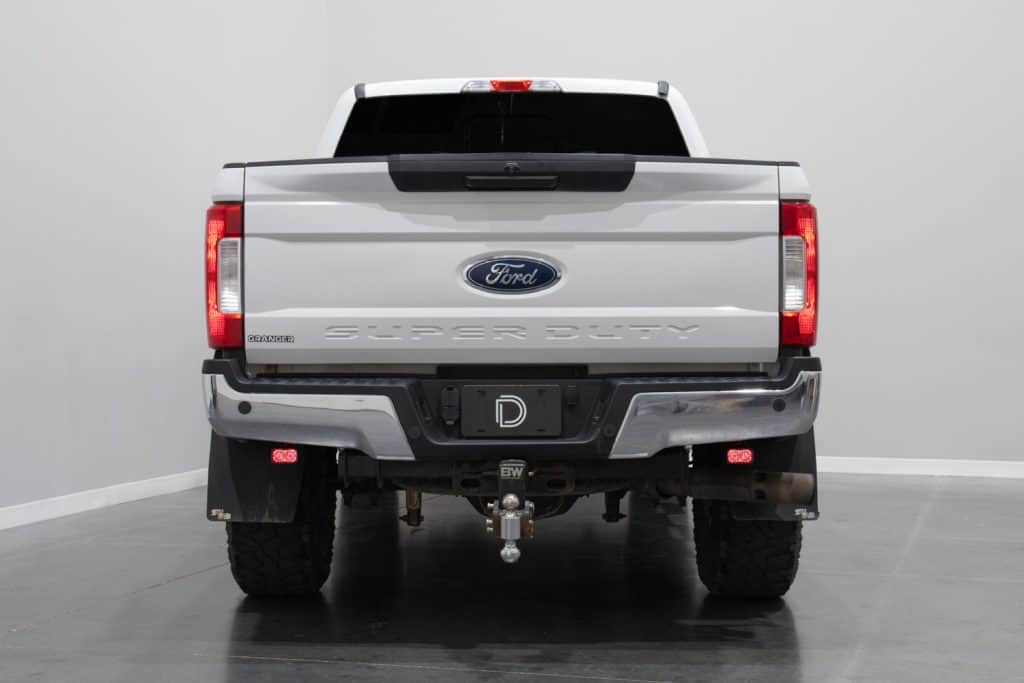 Diode Dynamics Stage Series Reverse Light Kit For 2017-2023 Ford Super Duty C1 23 Shared Super Duty bracket location and red-backlight demonstration with older SSC2 pods. This listing supplies smaller C1 pods.
