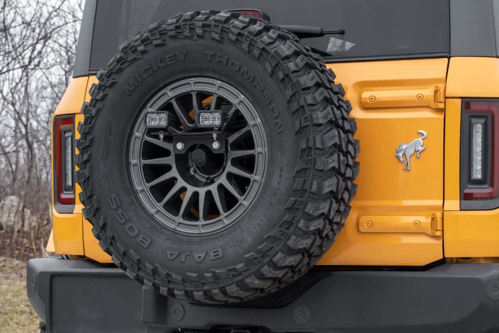 Diode Dynamics Stage Series Reverse Light Kit For 2021-2025 Ford Bronco C2 2.0 47 Two-inch pod location beside the Bronco spare tyre. Other rear lighting is separate.