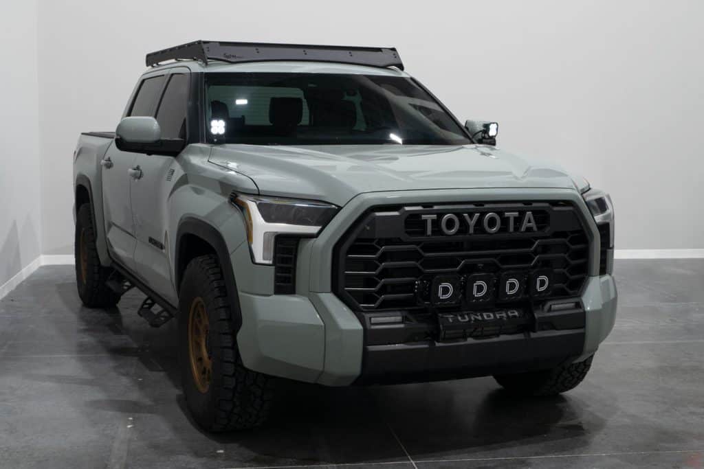 Diode Dynamics Stage Series Ditch Light Kit For 2022+ Toyota Tundra Ss3 40 SS3 ditch lights installed on the Tundra. The grille lights, roof rack and other vehicle accessories are separate.