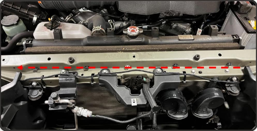 2014–2024 Toyota 4Runner Xb Evo &Amp; Evo Hybrid Installation Guide 33 Secure the long DRL branch across the radiator support to the passenger side.