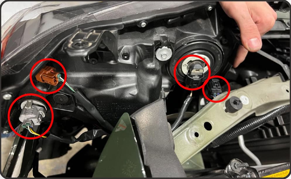 2014–2024 Toyota 4Runner Xb Evo &Amp; Evo Hybrid Installation Guide 13 Lift the tabs, ease the lamp forward and disconnect its four connectors.