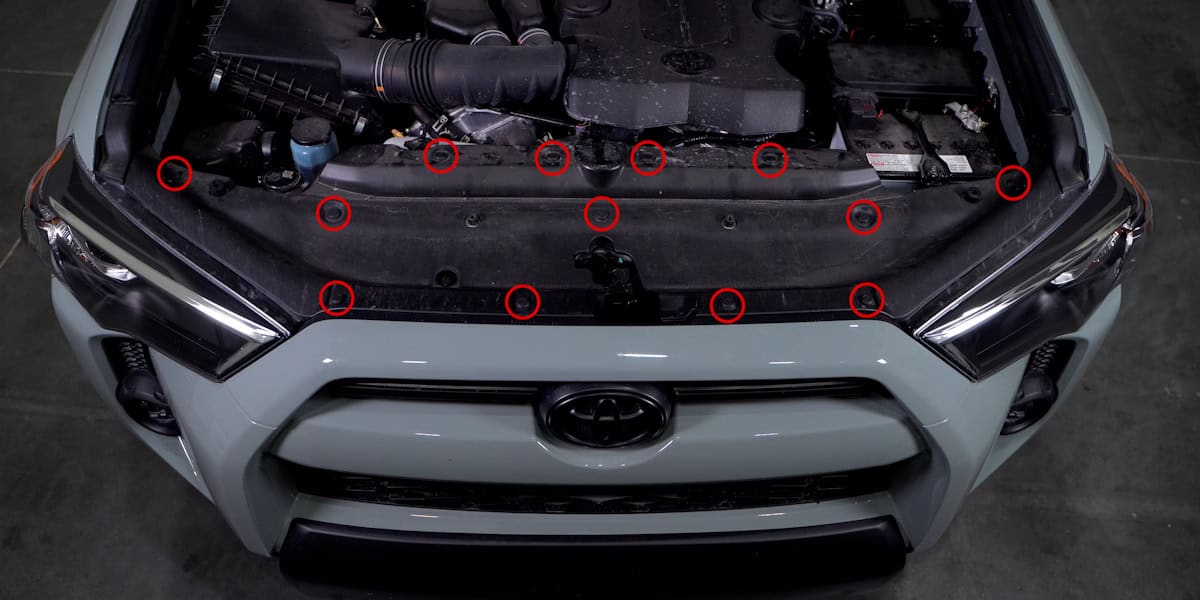 2014–2024 Toyota 4Runner Form Headlight Installation Guide 1 Remove the thirteen radiator-cover clips.