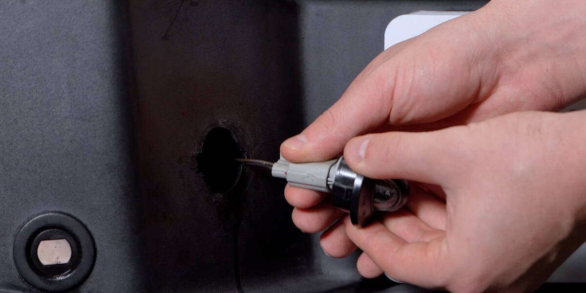 Toyota 4Runner Form License Plate Light Installation Guide 4 Method example: twist the bulb holder out of the original housing.