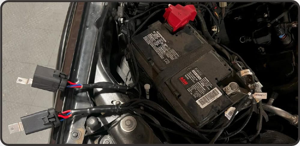 2021–2023 Ford F-150 Morimoto 4Banger Fog Light Installation Guide 25 Morimoto installation illustration: route the harnesses and refit the bumper (1 of 5).