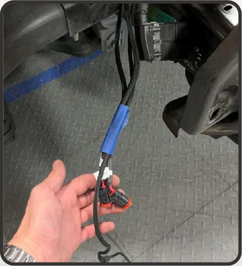 2021–2023 Ford F-150 Morimoto 4Banger Fog Light Installation Guide 27 Morimoto installation illustration: route the harnesses and refit the bumper (3 of 5).