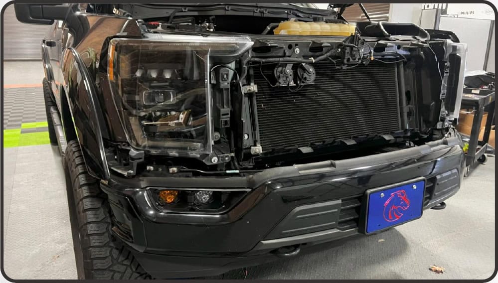 2021–2023 Ford F-150 Morimoto 4Banger Fog Light Installation Guide 28 Morimoto installation illustration: route the harnesses and refit the bumper (4 of 5).