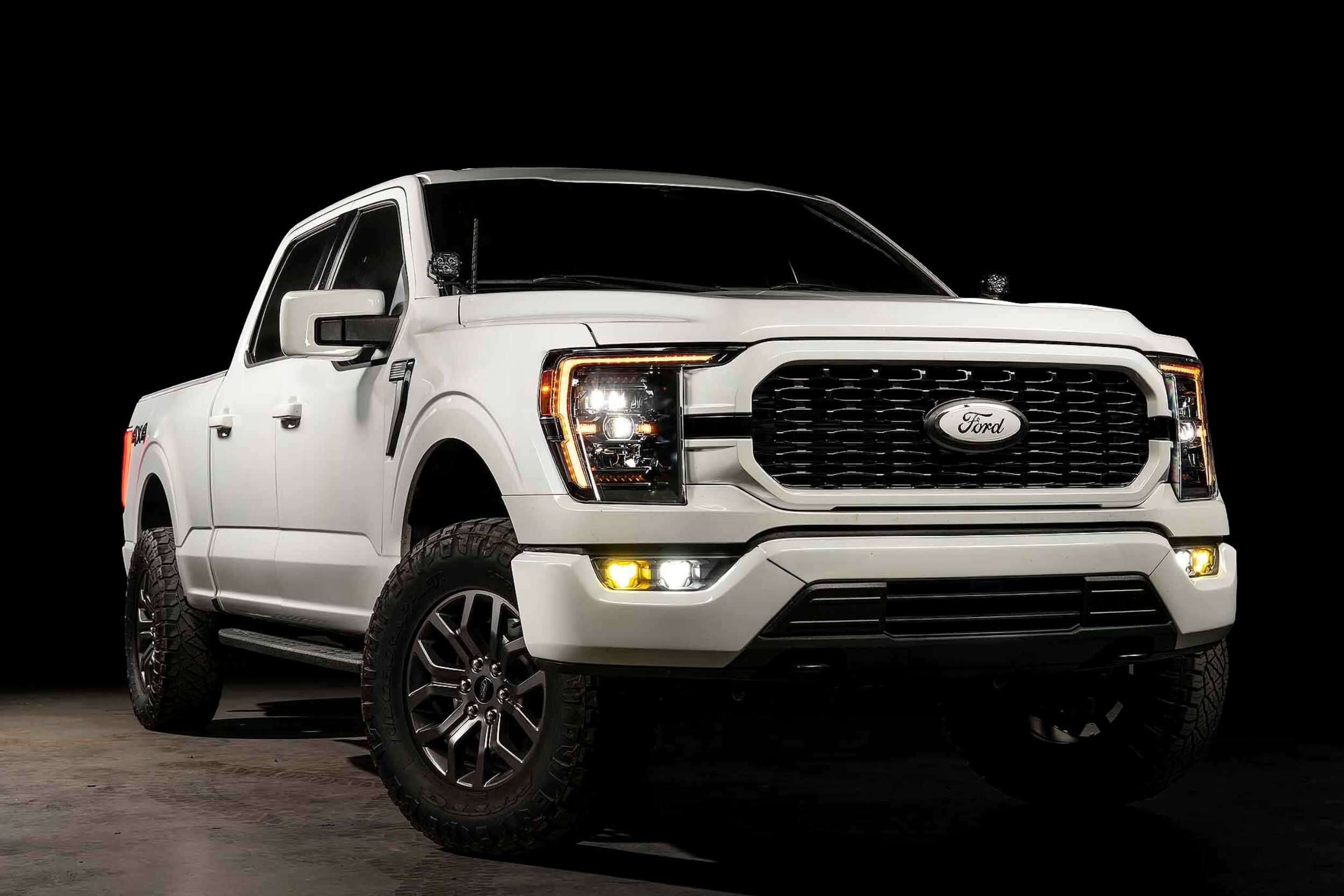 Morimoto 4Banger Dual Fog Light Kit For 2021–2023 Ford F-150 124 Morimoto 4Banger fog kit installed in a 2021–2023 F-150 factory fog-light bumper.