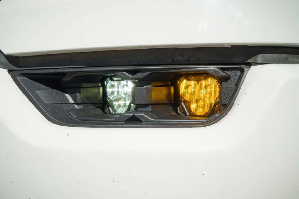 How To Plan A 2021–2023 Ford F-150 Lighting Upgrade 7 White and Yellow Morimoto 4Banger pods fitted in an F-150 fog opening