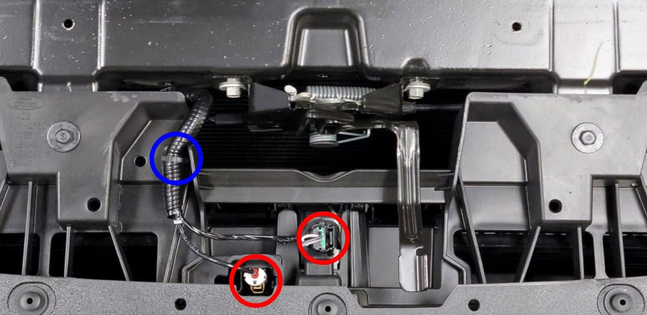 F-150 Elite Headlight Installation Guide | Bts Lighting 4 Disconnecting the Ford F-150 grille harness connectors