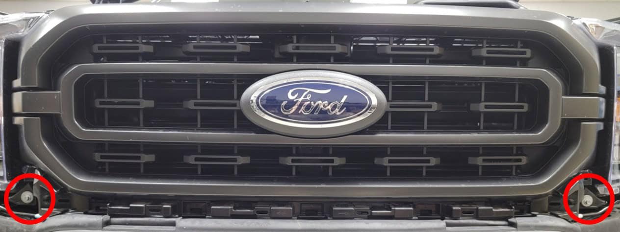 F-150 Elite Headlight Installation Guide | Bts Lighting 6 Removing the lower Ford F-150 grille bolts