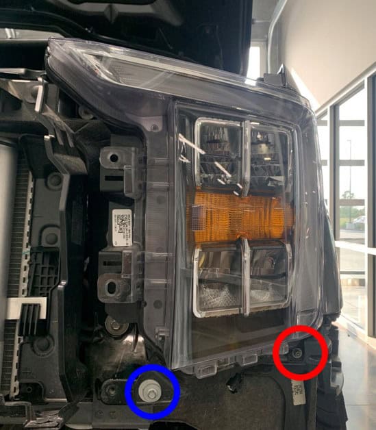 F-150 Elite Headlight Installation Guide | Bts Lighting 9 Removing the lower factory headlight fasteners