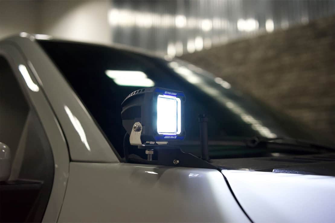 Procomp Gen3 Ditch Light Kit For 2021–2023 Ford F-150 / Raptor 5 ProComp ditch light installed beside the F-150 windshield.