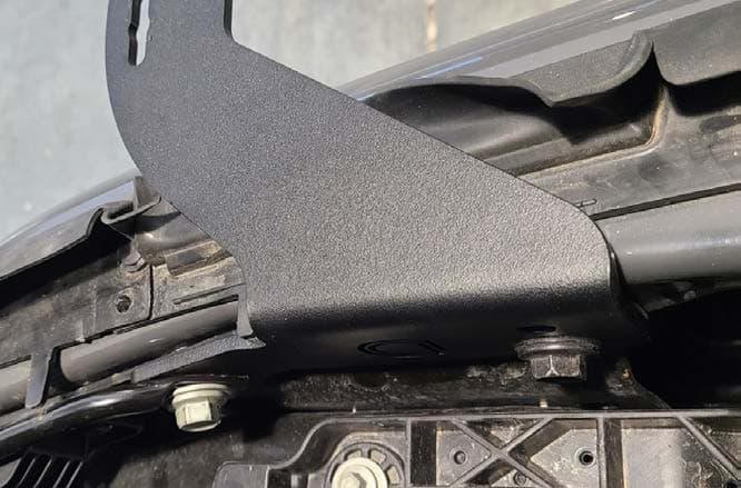2021–2023 Ford F-150 Ss5 Crosslink Installation And Backlight Guide 7 Vehicle-specific bracket and its two factory mounting bolts.