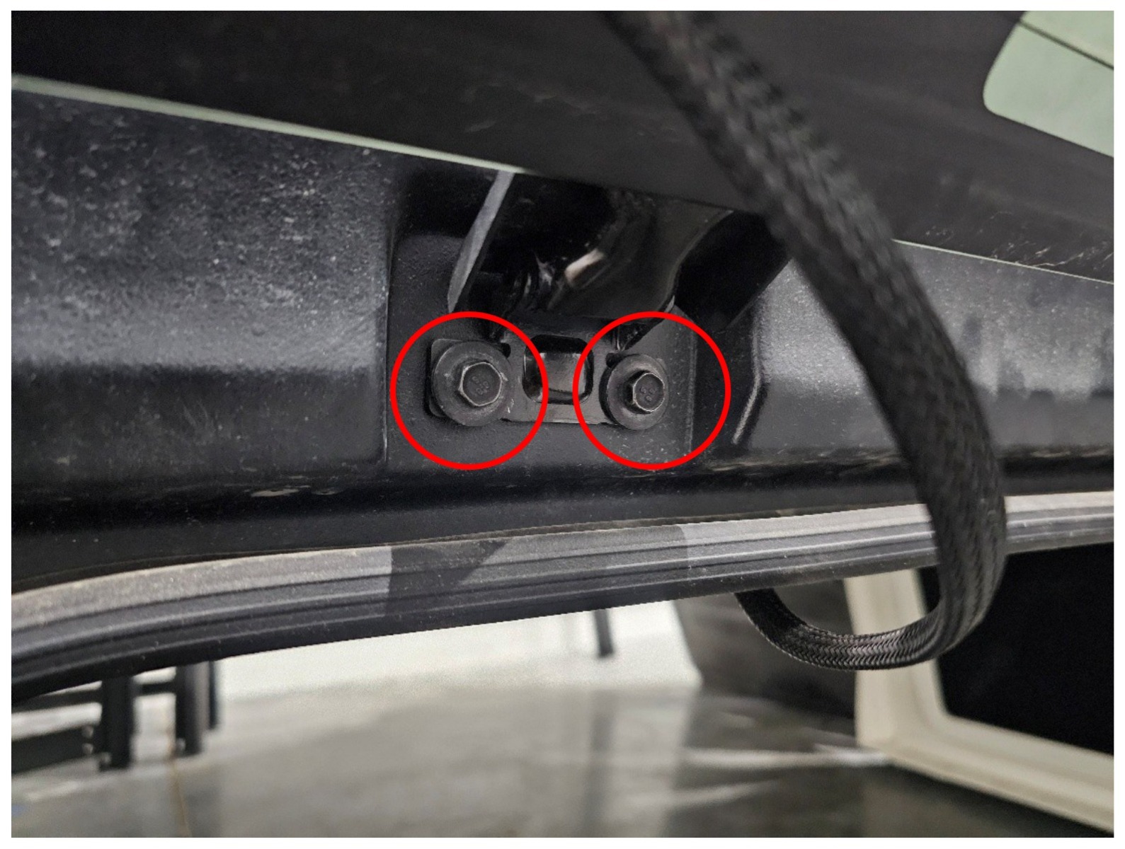 Jeep Jl Rear Hardtop Ss30 Light Bar Installation 1 Remove the driver-side hinge screws. Manufacturer installation photograph.