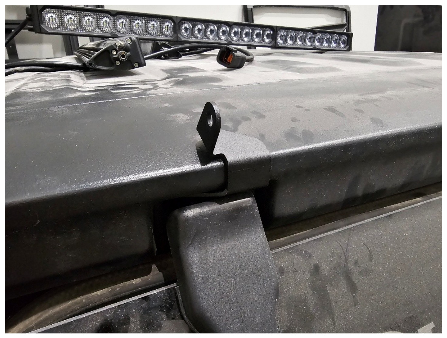 Jeep Jl Rear Hardtop Ss30 Light Bar Installation 3 Secure the first bracket. Manufacturer installation photograph.