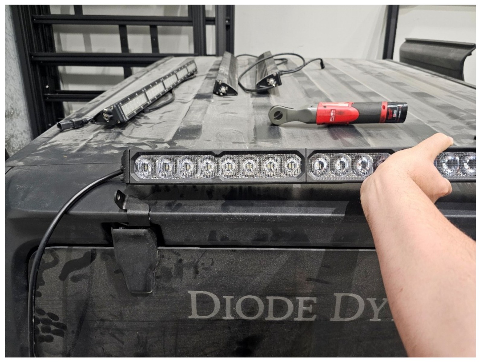 Jeep Jl Rear Hardtop Ss30 Light Bar Installation 5 Position the light bar. Manufacturer installation photograph.