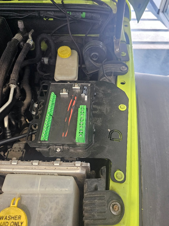 Jeep Jk D-Switch Hub Mount And Wiring Guide 4 Secure the mounting bracket. Original Diode Dynamics Jeep JK installation photograph.