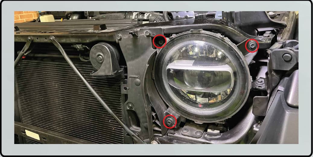 Jeep Jl / Jt Morimoto Super7 Headlight Installation 4 Three factory headlight mounting bolts
