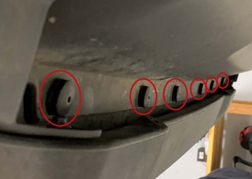 Jeep Ss3 Type M, Mr And Ms Fog Light Installation Guide 5 Original annotated Jeep Sport splash-guard photo: eight front push rivets and two lower bolts.