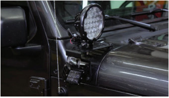 Jeep Jl Cowl Light Bracket Installation Guide 3 Auxiliary light mounted to a cowl-bracket slot; lamp shown as an installation example.
