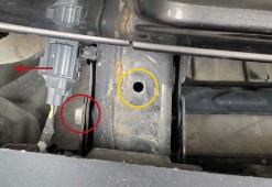 Jeep Jl Ss5 Bumper And Grille Installation Guide 4 Original annotated frame-rail photo: yellow marks the hole enlarged to 10 mm; red marks the bumper bolt.