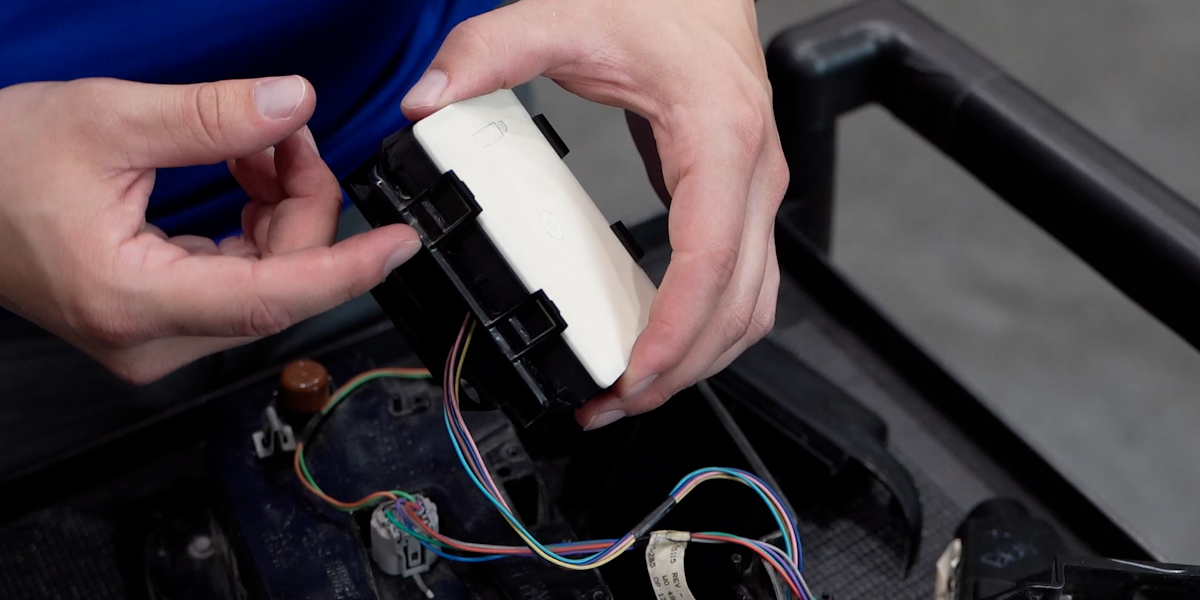 Jeep Jl Form Tail Light Installation 10 Release the carrier tabs around the blind-spot module.