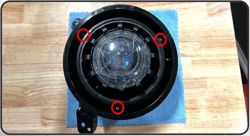 Jeep Jl/Jt Morimoto Super7 Halo Installation 3 Three screws holding the projector mounting ring.
