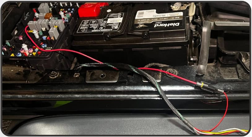 Jeep Jl/Jt Morimoto Super7 Halo Installation 17 Fuse-tap lead routed to the red passenger-side power input.