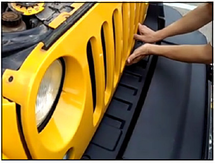 Pro Comp 76402P Jeep Headlight Installation Guide 3 Manufacturer photo: pull the lower grille forward to release its clips.