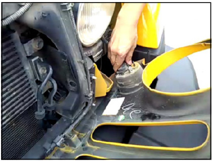 Pro Comp 76402P Jeep Headlight Installation Guide 1 Manufacturer photo: unplug the grille turn-signal connector.