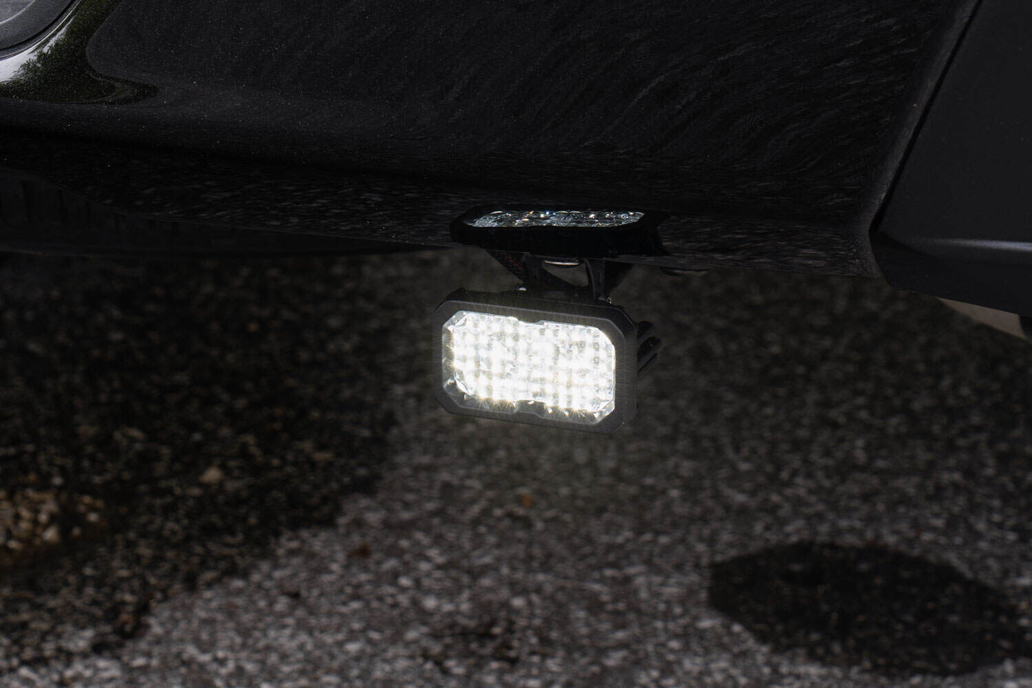 Diode Dynamics SSC2 white reverse light mounted below a rear bumper