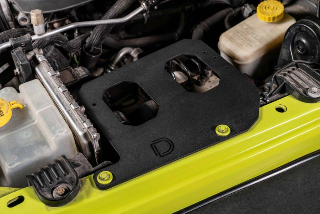 Jeep JK Wrangler D-Switch Hub bracket mounted in the engine bay
