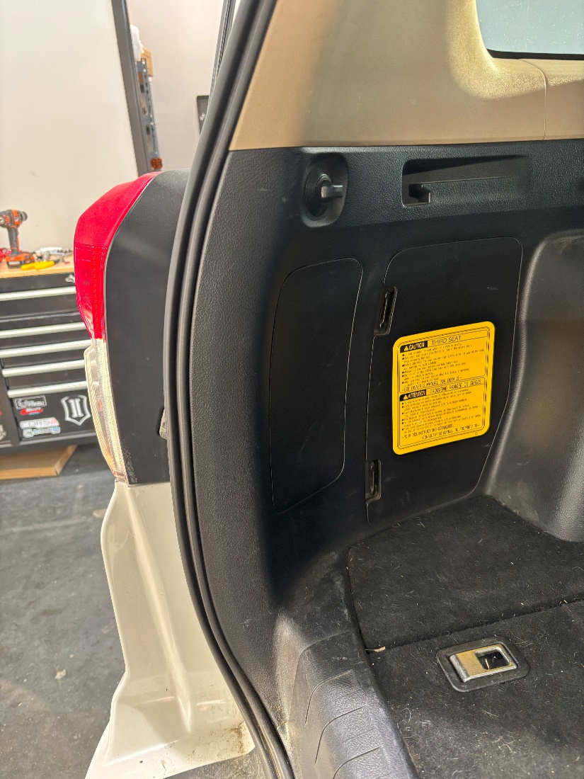 Form Tail-Light Installation: 2010–2024 Toyota 4Runner 13 Refit the interior access panel.