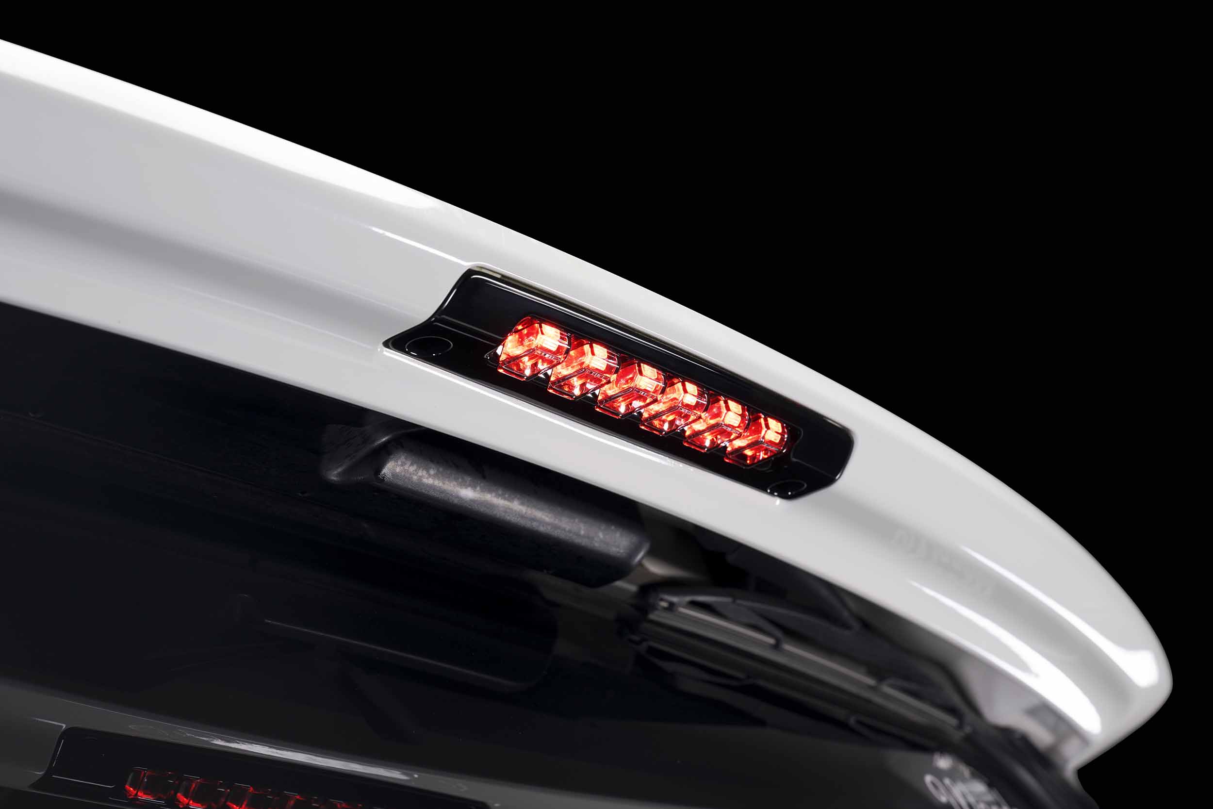 Morimoto X3B Led Third Brake Light For Toyota 4Runner And Related Applications 4 X3B70 illuminated at the rear spoiler.