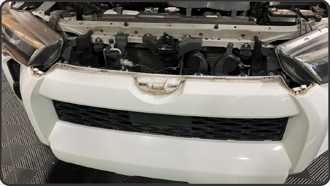 2014–2024 Toyota 4Runner Xbg Grille Installation Guide 13 Clean the center bumper surface before fitting the supplied fascia panel.