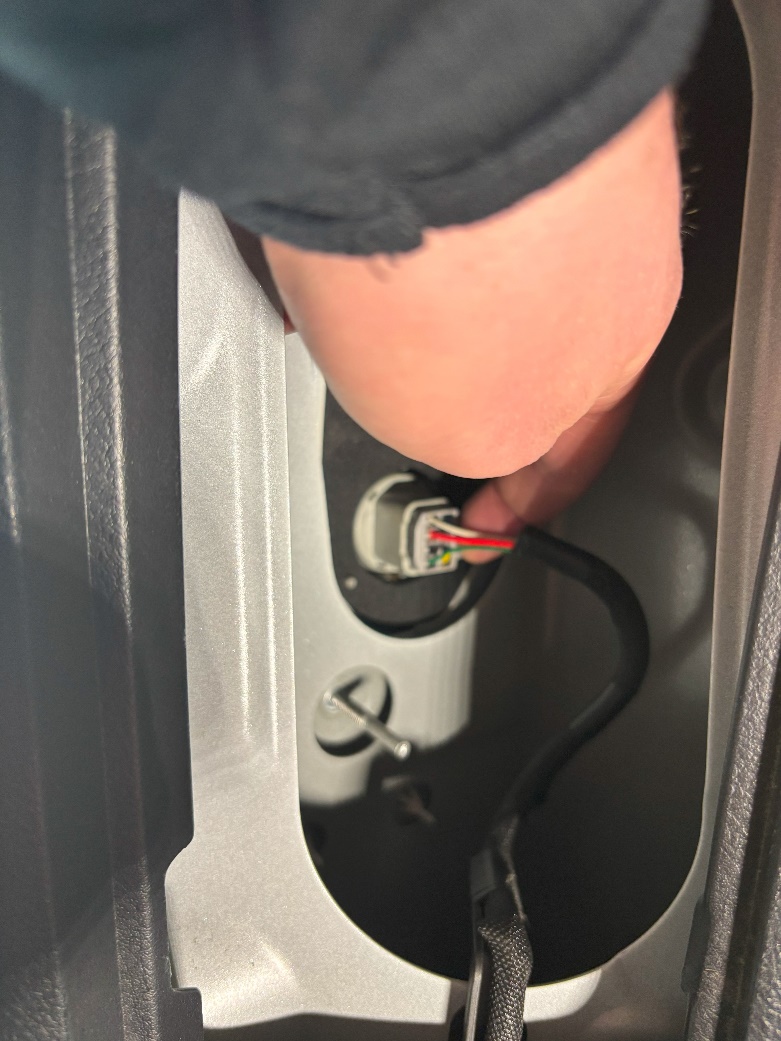 Form Tail-Light Installation: 2010–2024 Toyota 4Runner 5 Release the factory harness connector.