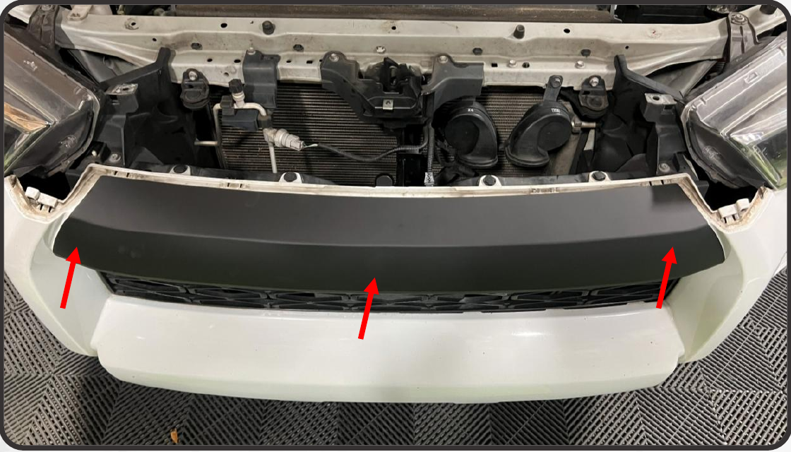 2014–2024 Toyota 4Runner Xbg Grille Installation Guide 15 Center the panel and press it firmly onto the clean bumper surface.