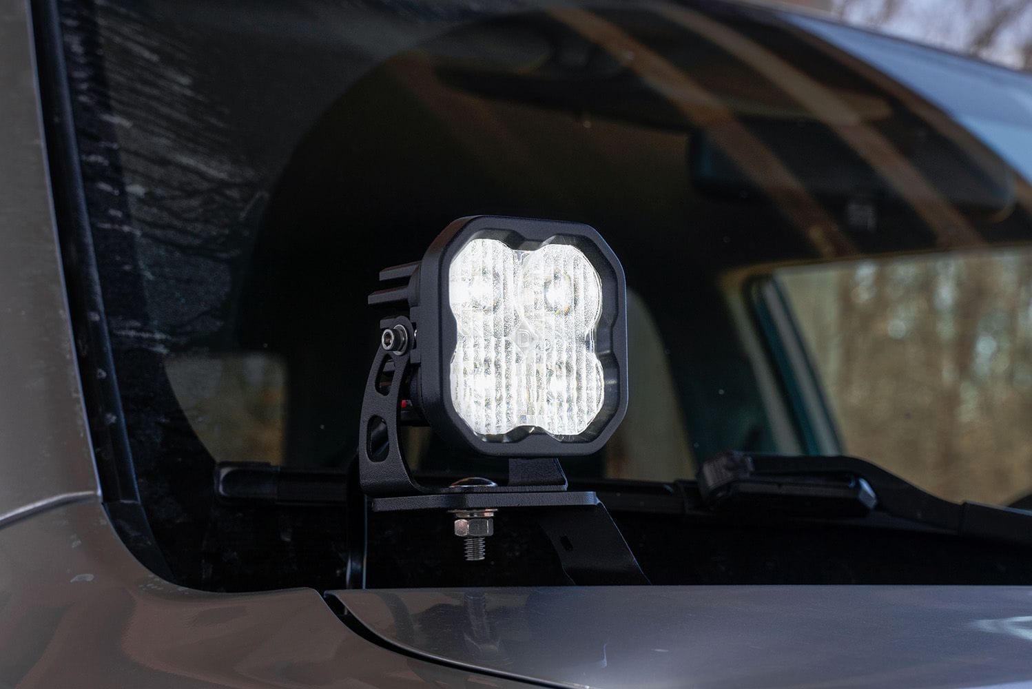 SS3 pod mounted at the 4Runner hood hinge; the selected kit supplies two pods.
