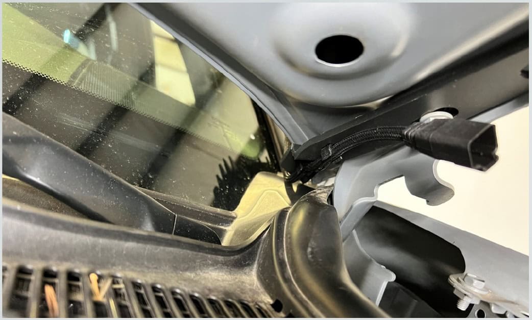 Tacoma Morimoto Ditch-Light Bracket Installation Guide 12 Use the clips to route the cable beneath the hood.