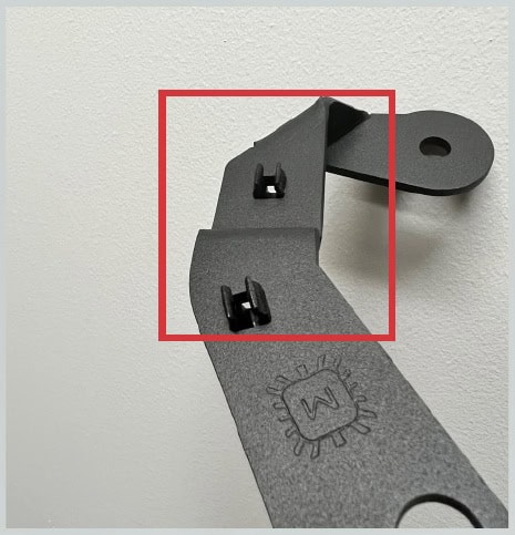Tacoma Morimoto Ditch-Light Bracket Installation Guide 3 Insert the wire-management clips into the bracket’s square holes.