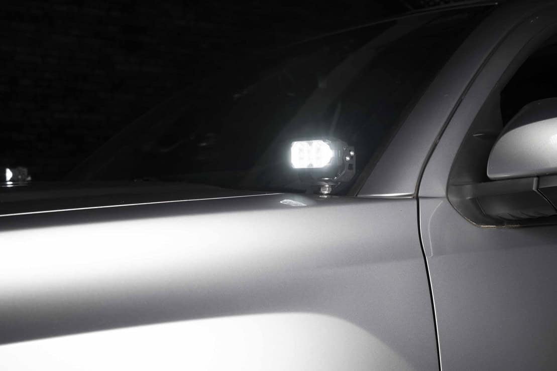 Morimoto 2Banger Complete Ditch Light Kit For 2016–2023 Toyota Tacoma 8 White 2Banger mounted and lit.