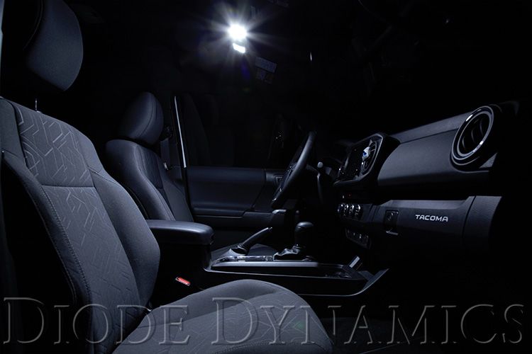 Diode Dynamics 194 Blue Or Green Interior Led Bulbs (Pair) 52 Manufacturer White-output map-light example, showing housing and model comparison only. Selected Blue/Green bulbs are pictured separately.